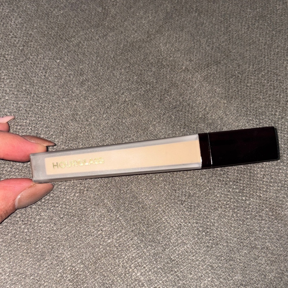 Hourglass Airbrush Concealer in color SEPIA. Warm beige.